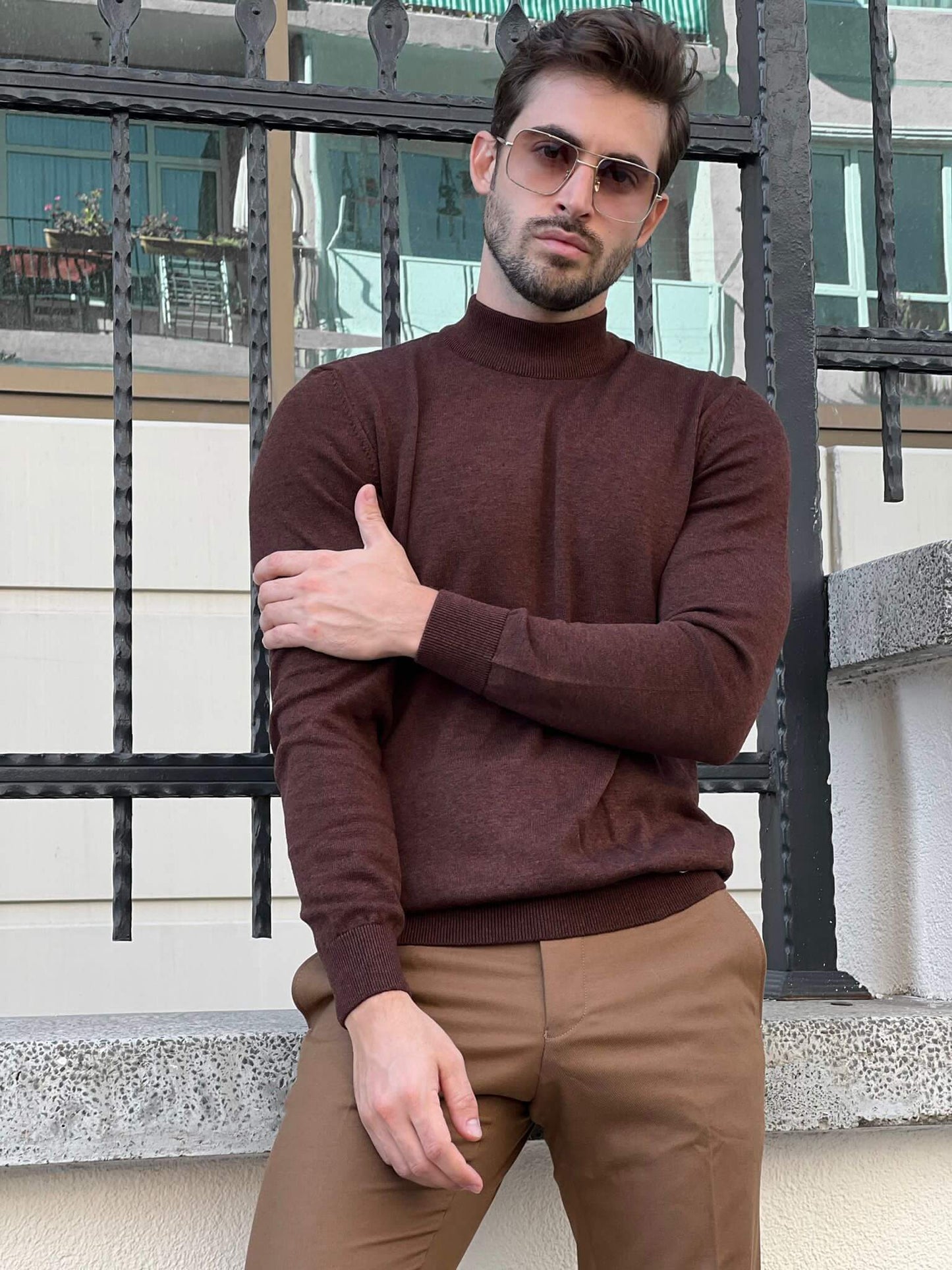 Myall Brown Mock Turtleneck with a soft, ribbed texture, featuring a high collar that covers the neck and subtle brown hue."