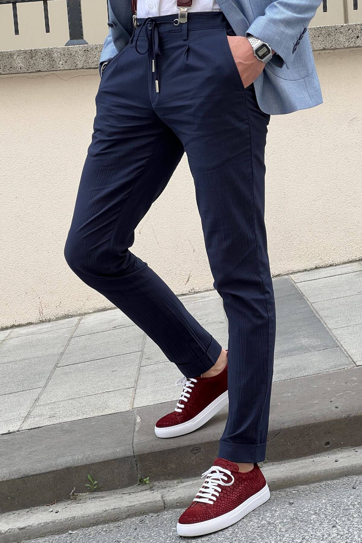 A Slim Fit Navy Blue Trouser on display