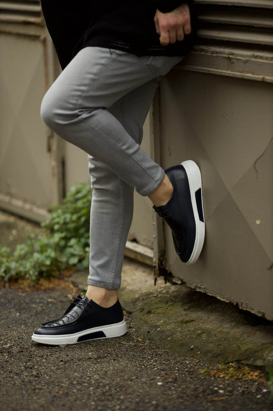 A Navy Blue Detailed Design Shoe on display.