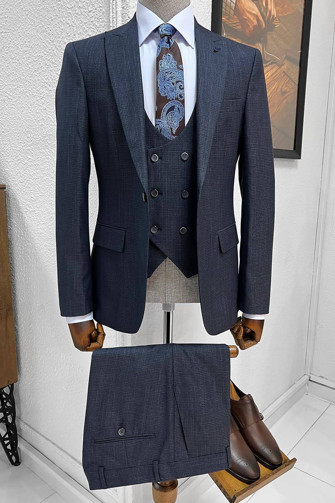 A Patterned Slim-Fit Navy-Blue Wool Suit on display