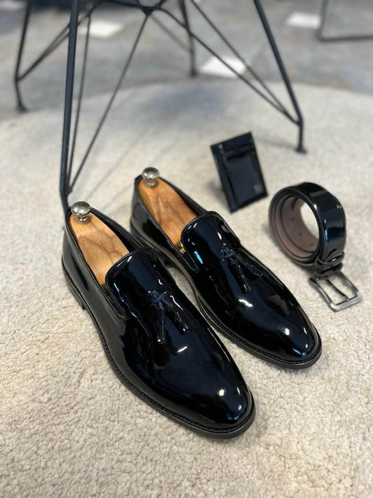 Berlin black leather tassel loafers with a neolite sole, designed for fall-winter smart casual and formal wear.