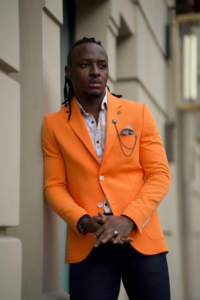 Onyx Orange Jacket worn by a model