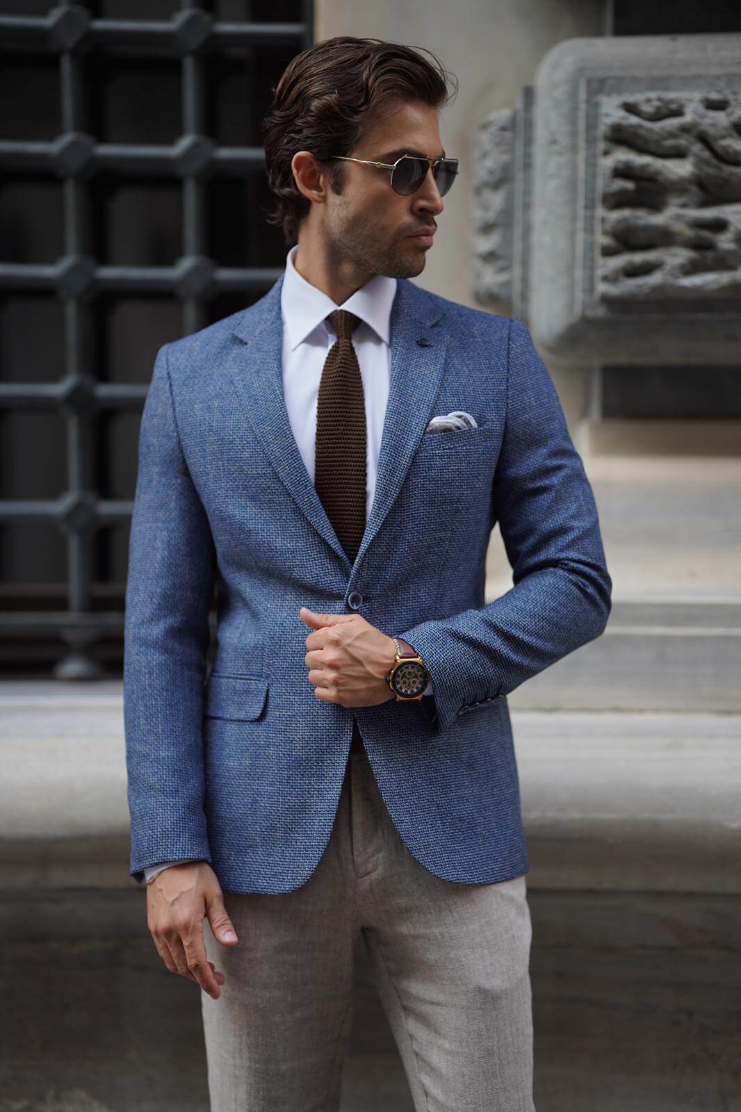 A Slim-Fit Mono Collar Knitted Blue Jacket on display
