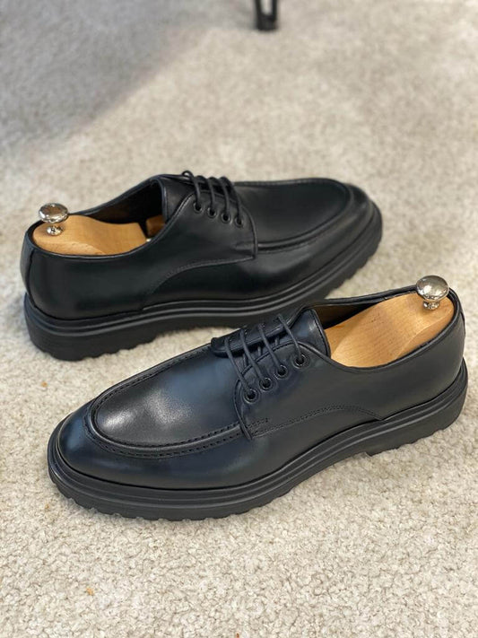 Premium men's black leather derby shoes with sleek lace-up design and EVA soles, crafted for fall-winter wear and versatile formal styling.