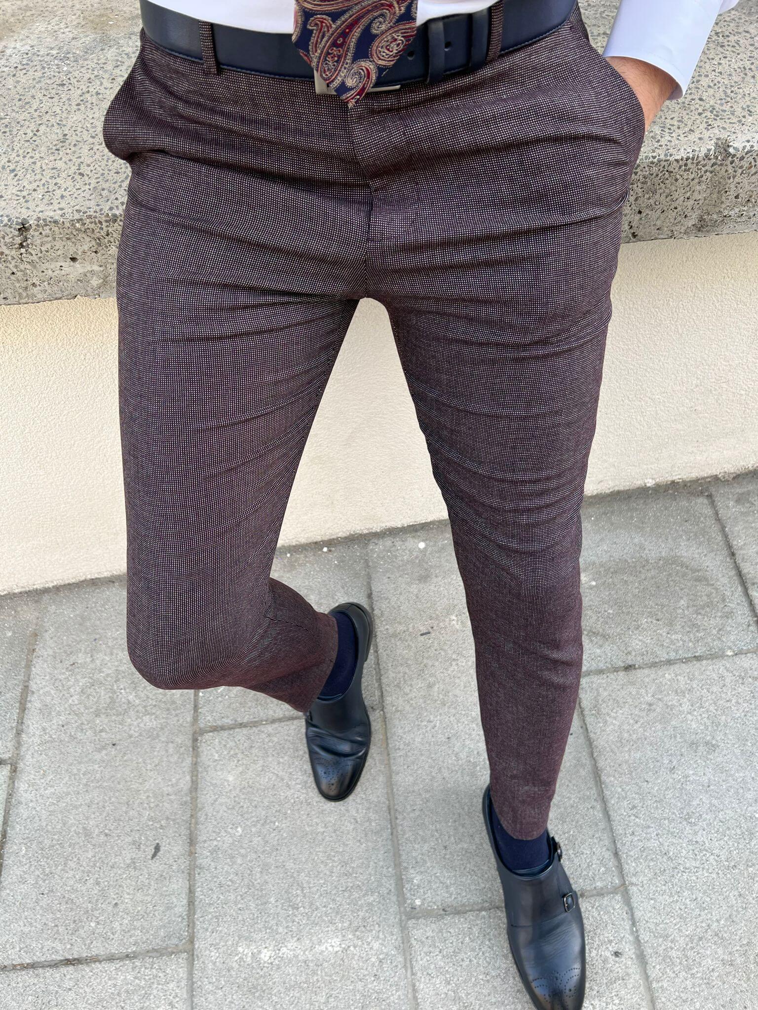 A pair of stylish patterned claret red pants showcasing a unique design