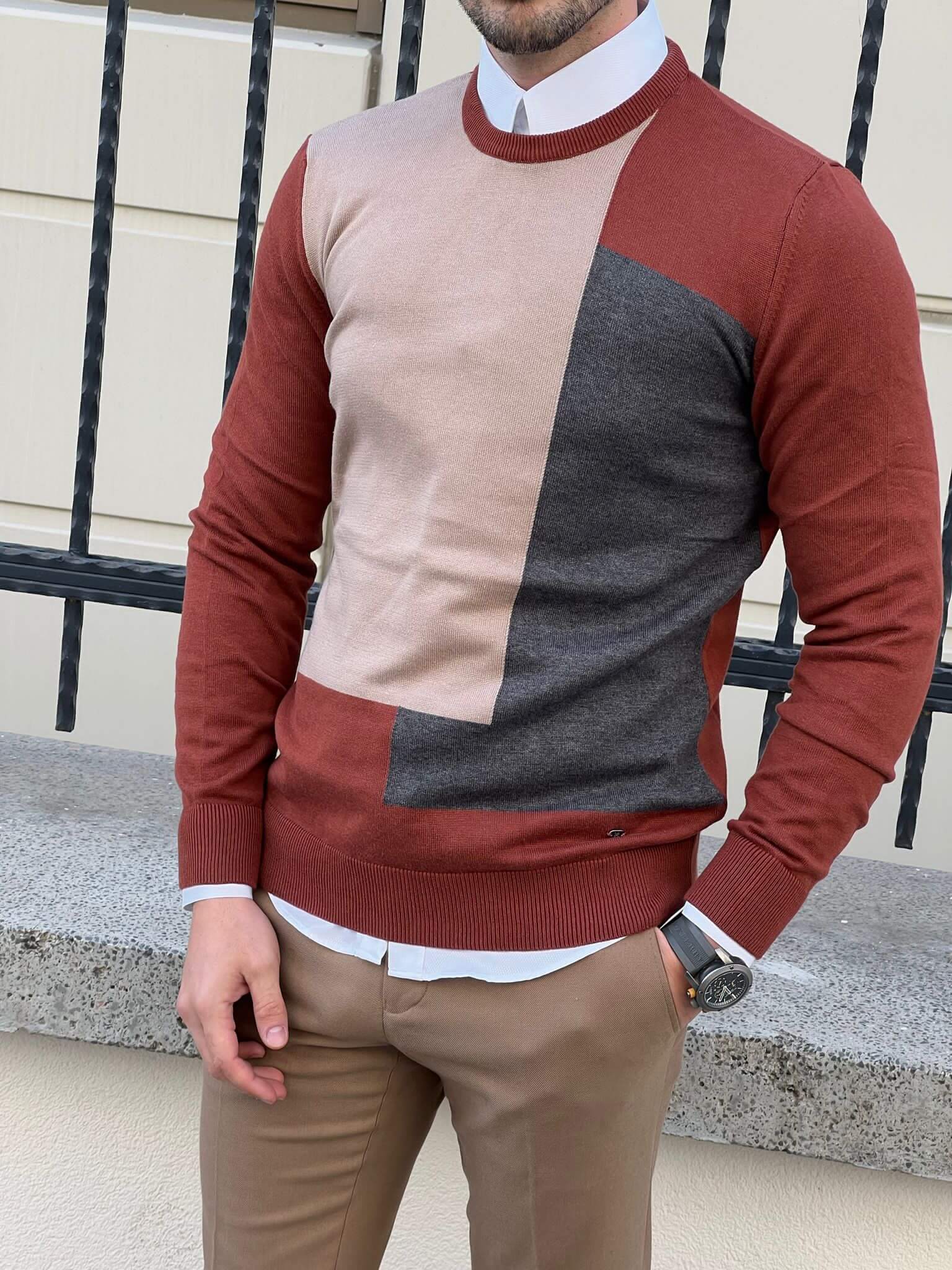 A cozy crewneck sweater with a vibrant pattern of tiles