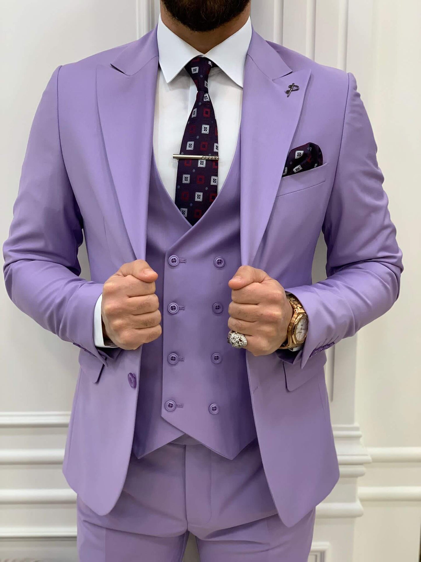 Model confidently showcasing HolloMen's Purple Slim Fit Suit, accentuating its sleek design and vibrant color.