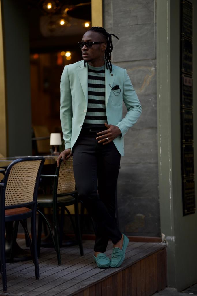 A stylish mint green jacket that adds a pop of color to any outfit