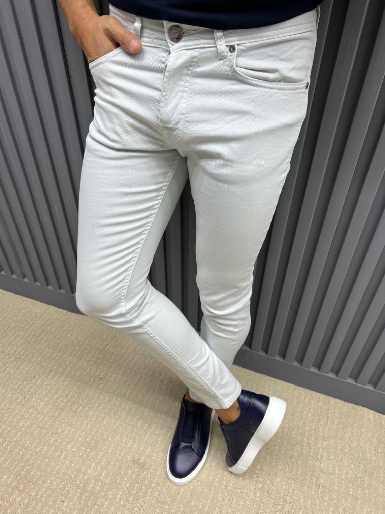 Slim Fit Beige Jeans on display