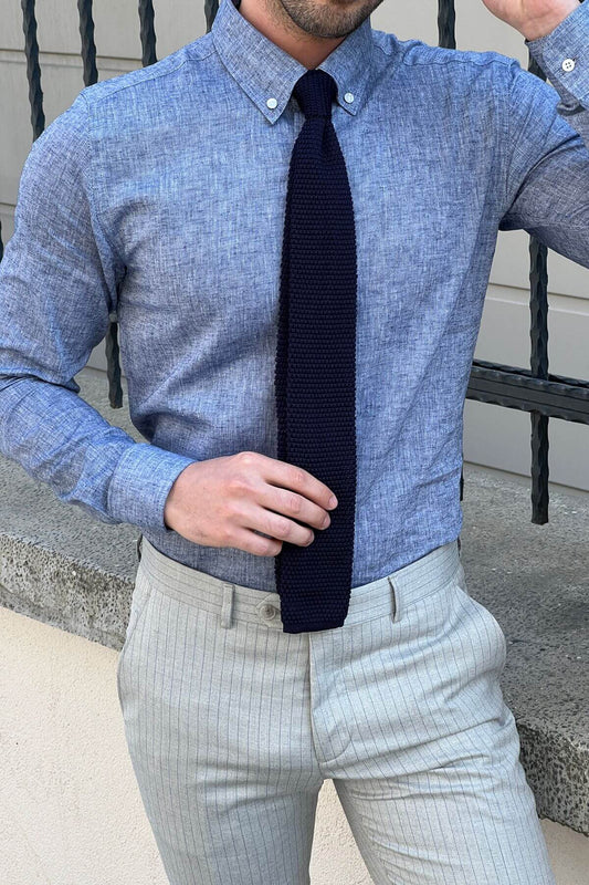 A Slim-Fit Blue Cotton Shirt on display