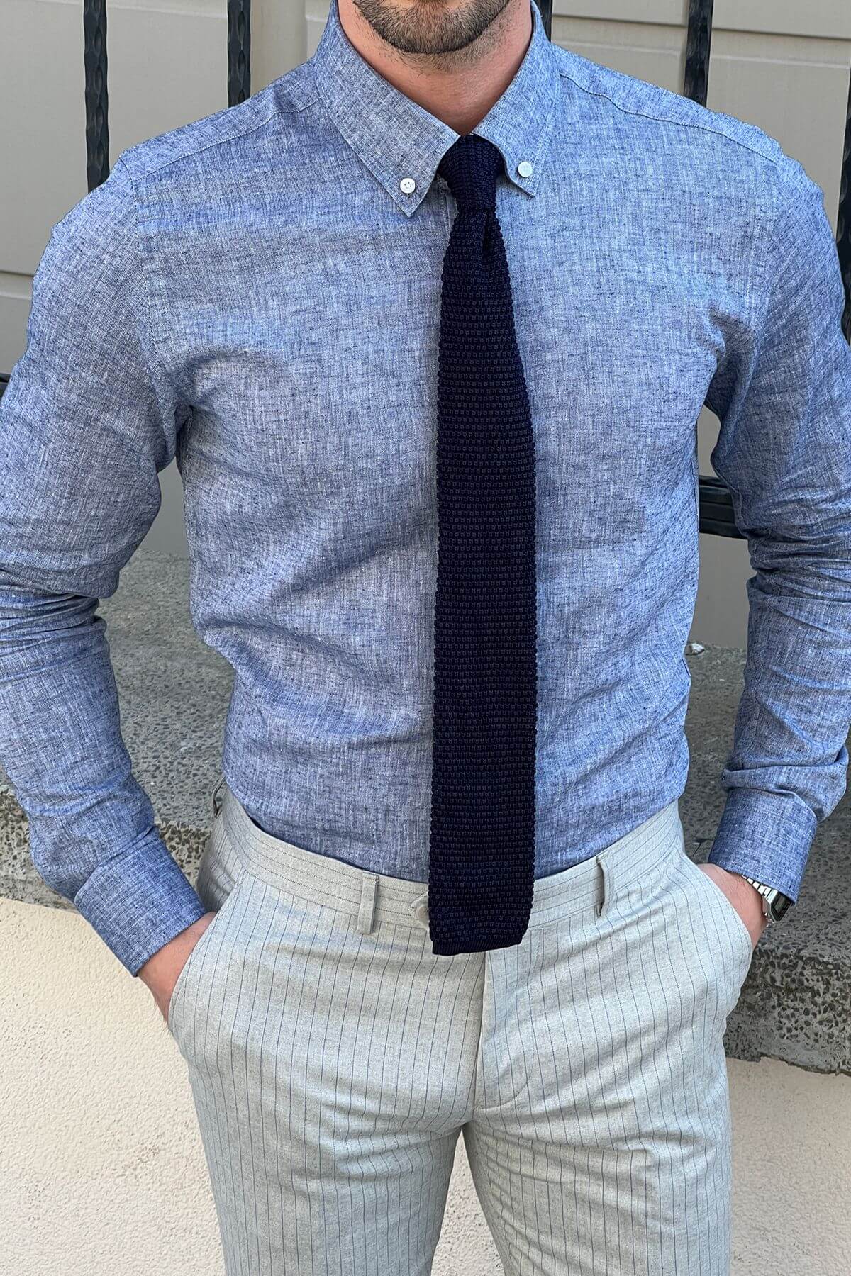 A Slim-Fit Blue Cotton Shirt on display