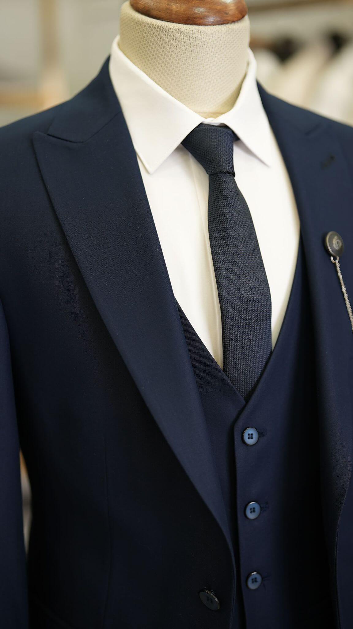 A Navy-Blue Suit on display.