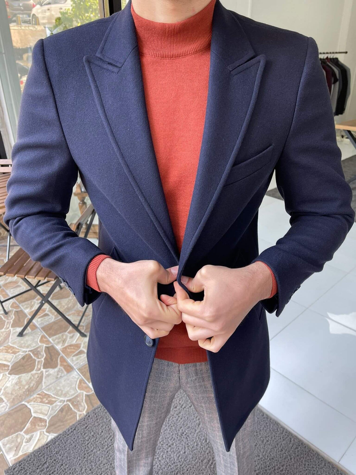 Navy blue wool coat with a slim fit