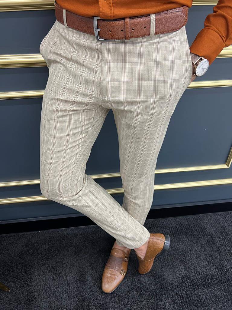 Striped beige pants featuring a timeless design and comfortable fit