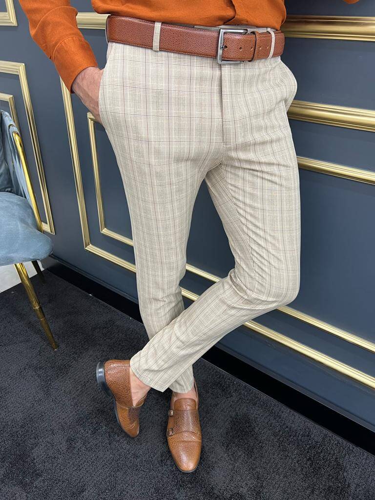 Striped beige pants featuring a timeless design and comfortable fit