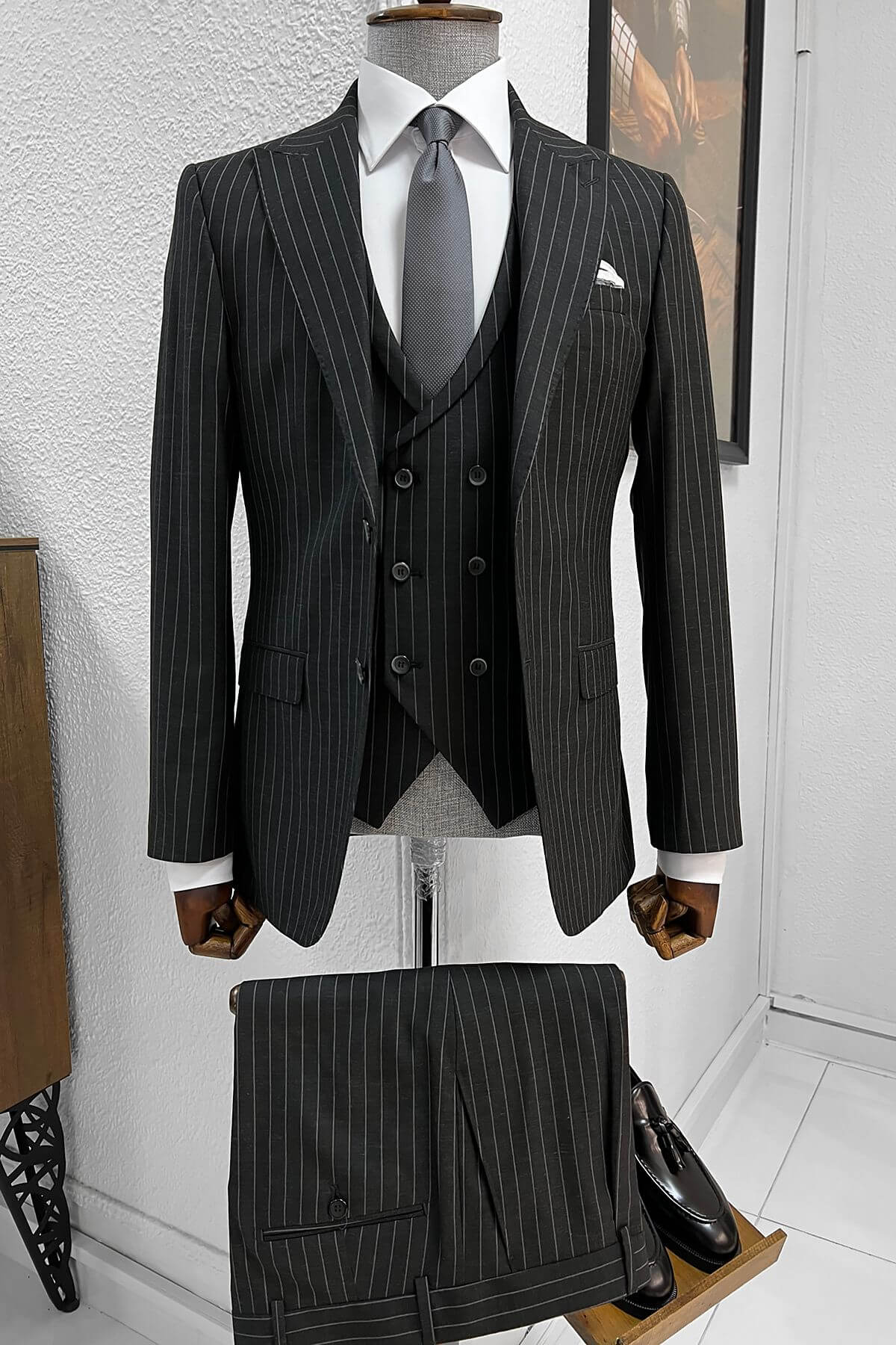 A Striped-Light Black- Suit on display