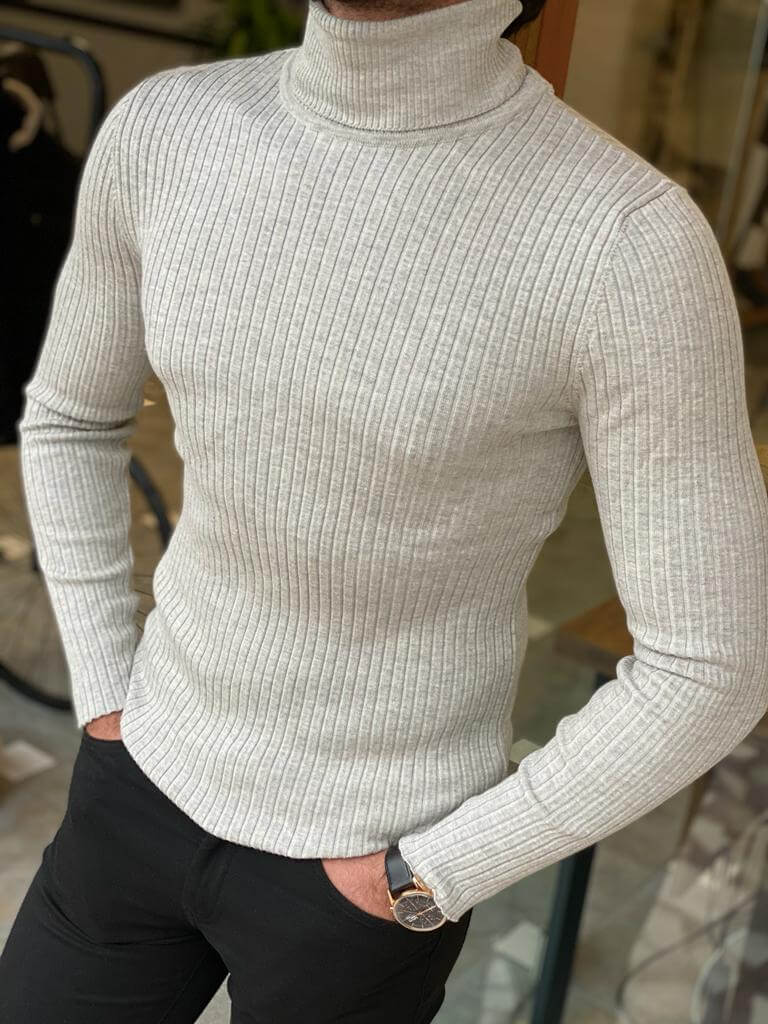 Close-up of a fashionable Striped Lycra Turtleneck, featuring bold vertical stripes in various colors, designed to fit snugly around the neck and torso."