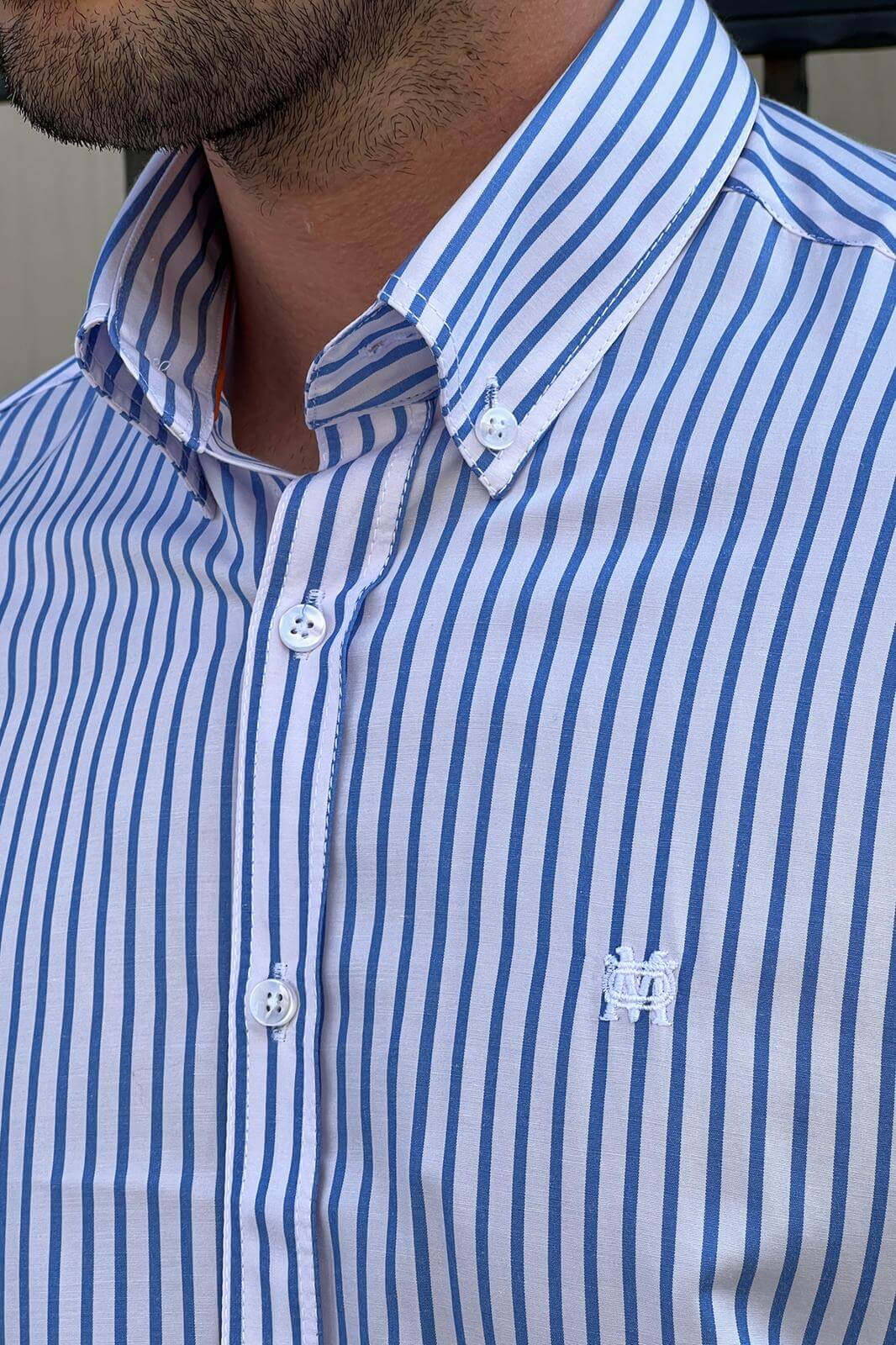 A Slim Fit Stripped white and Blue Cotton Shirt on display
