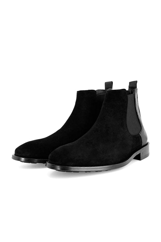 Elmore black suede Chelsea boots with elastic sides, displayed on a white backdrop.