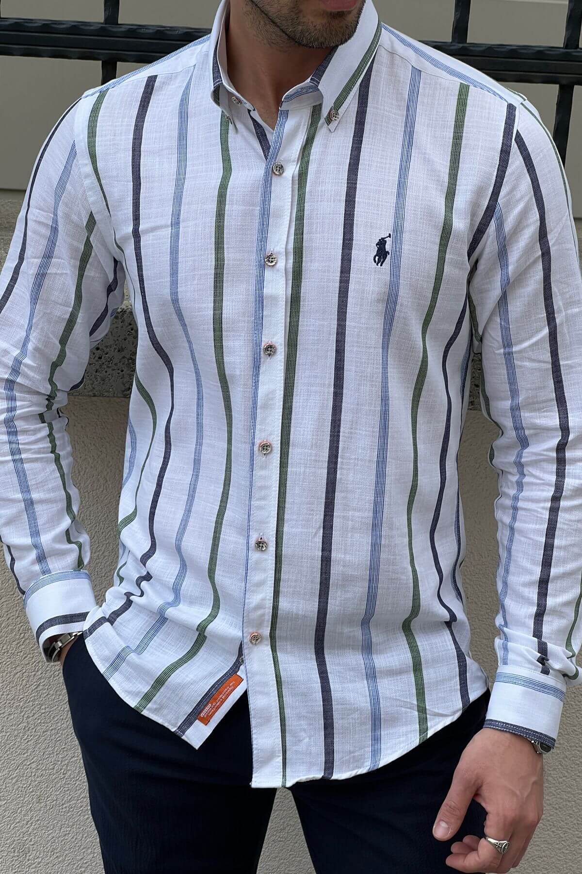 A White and Green Cotton Shirt on display