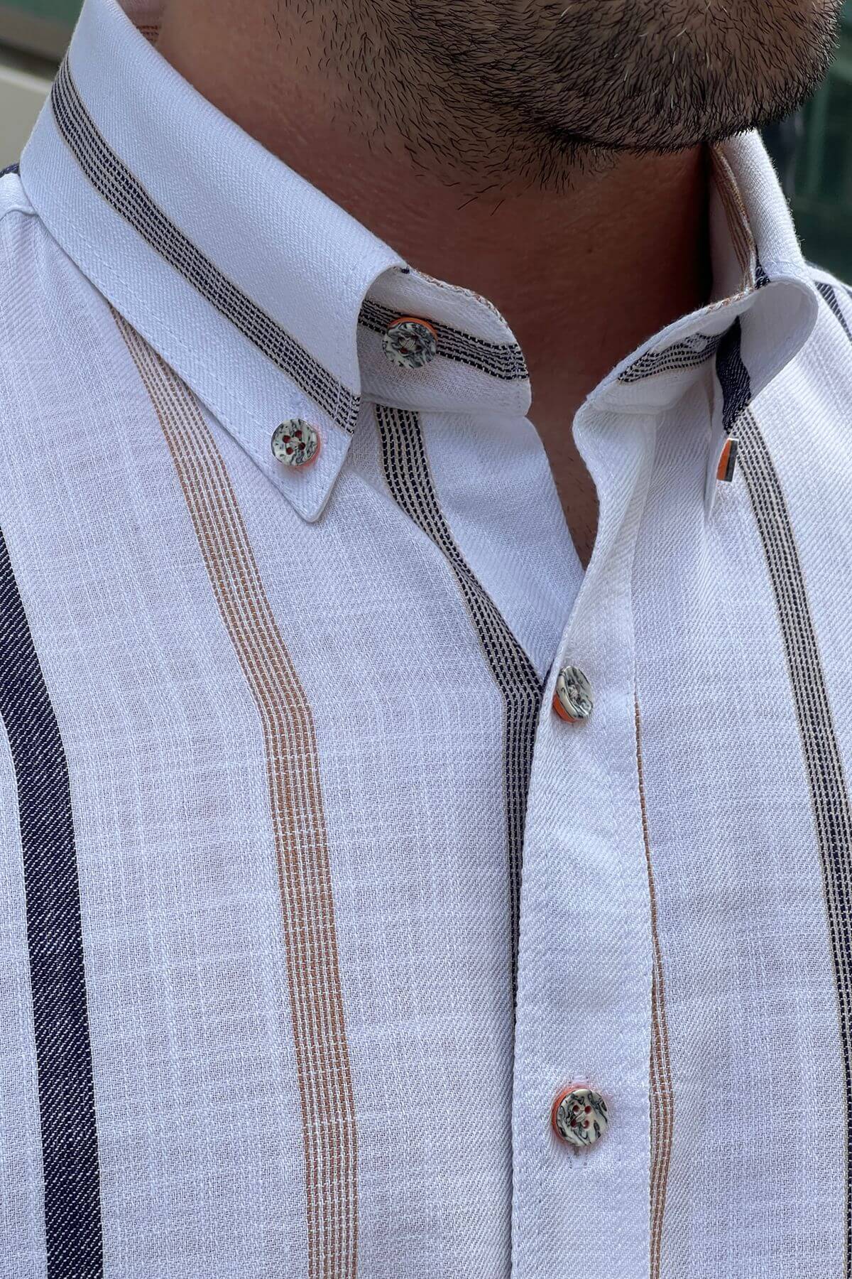 A White and Navy Blue Cotton Shirt on display