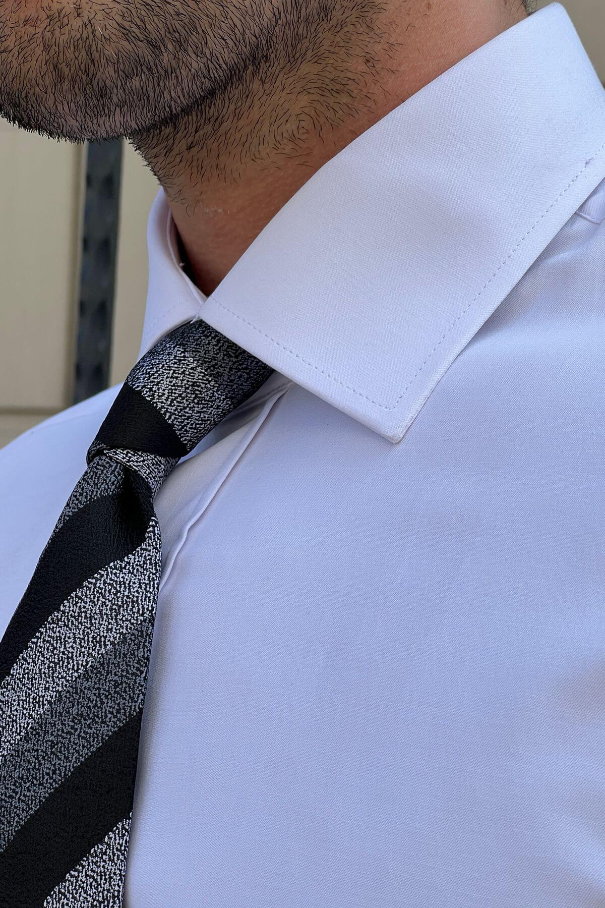 A Classic Collar White Cotton Shirt on display
