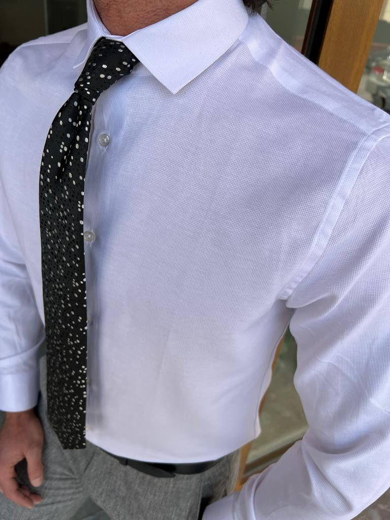 A classic white button-up shirt suitable for formal occasions