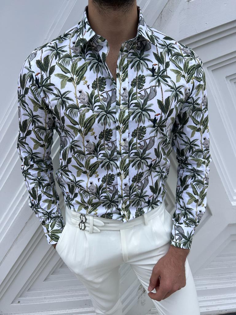 A fresh white shirt featuring intricate green leaf patterns